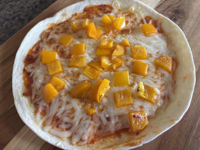 Step 5 is to enjoy your air fryer tortilla pizza!