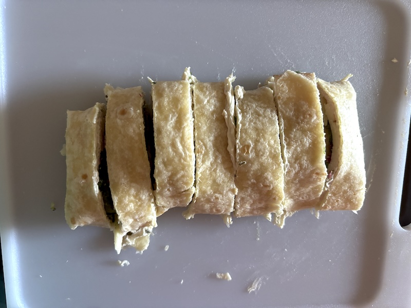 Spinach turkey cream cheese rollups cut in individual pieces