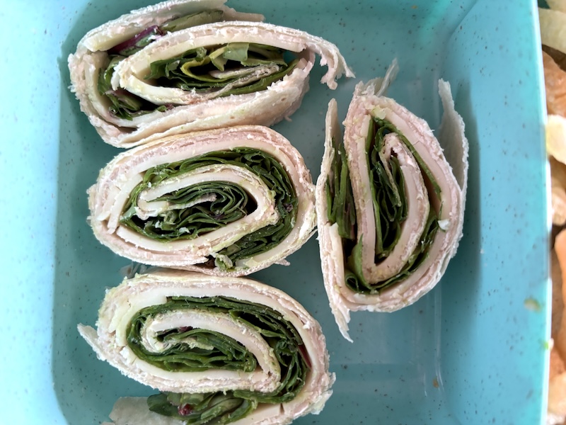 close up of spinach turkey cream cheese rollups